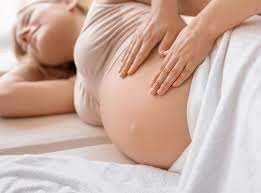 Prenatal hands on belly